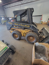 1998 New Holland Skid Steer Stock# 104126. 3100 Hrs Used - New Tires - Model LX665
