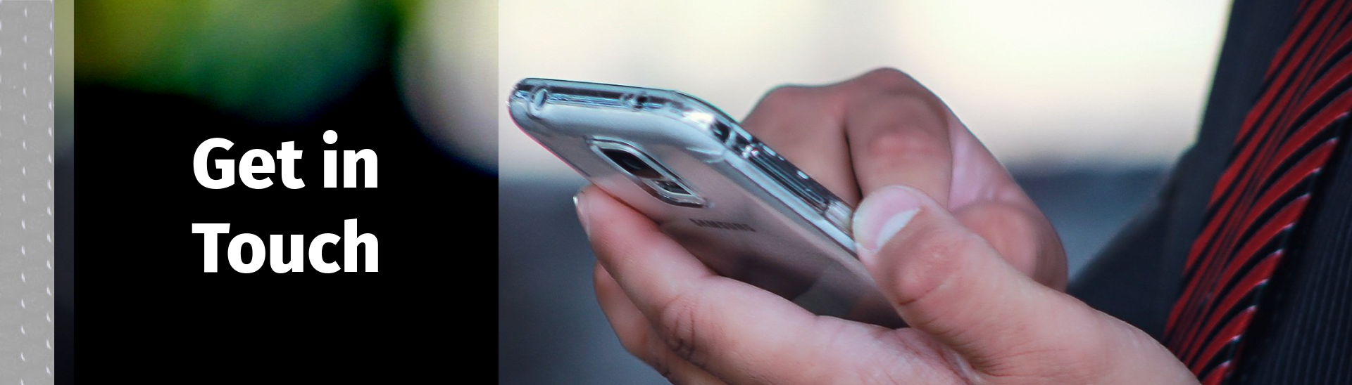 a picture of hands holding onto and typing on a cell phone